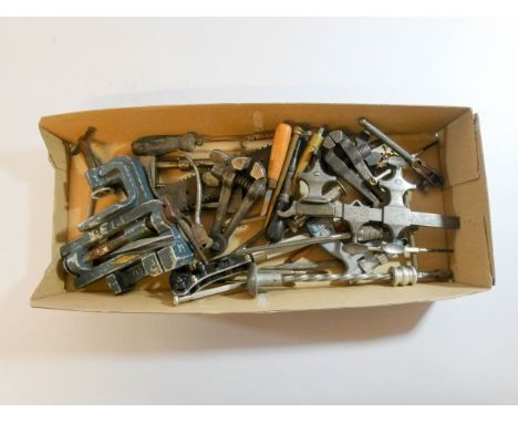 A collection of old watchmakers tools etc 