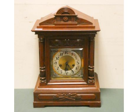 An Edwardian chiming bracket clock in a painted walnut case with a brass and silver dial 