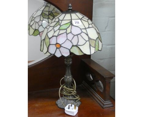 A floral decorated Tiffany style table lamp with shade 