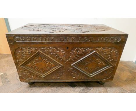 A 19th century heavy carved teak trunk , 38" wide 