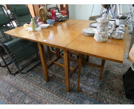 A light oak gate leg style dining table 3'3 wide 