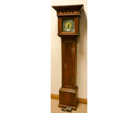 A striking 30 hour grandfather clock in oak case, with square brass and silver dial witted with a single hand, stamped P Bowe