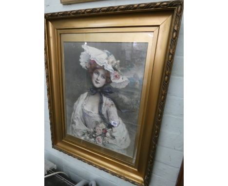 A late Victorian colour print of a young lady in a gilt frame 