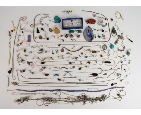Twenty-six silver pendants including agate, amber, opal triplet, etc, ten&nbsp;silver chains, tanzanite beaded necklace, silv