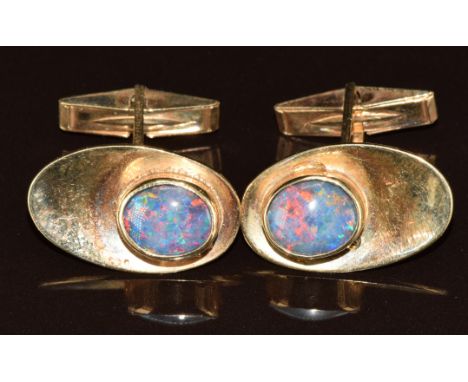 A pair of 9ct gold cufflinks set with opal doublets, 13.2g