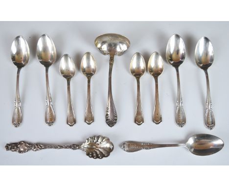 American silver cutlery to include an Art Nouveau sifter spoon, ladle and various teaspoons, length of longest 15cm, weight o