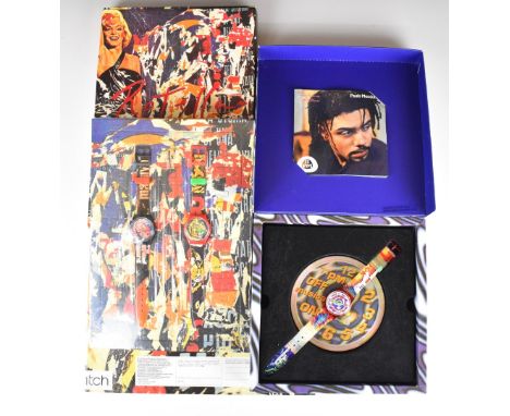 Three Swatch wristwatches MusiCall Paulo Mendonca 11PM SLZ103 and two Marylin Monroe Bengal GZ133, in original boxes.&nbsp;