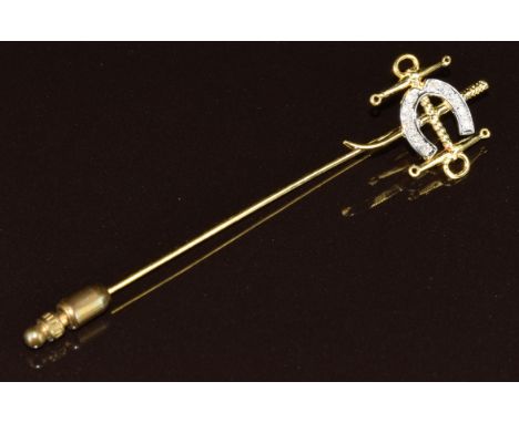 An 18k gold stick pin in the form of a horseshoe set with diamonds, 2.6g, 6.4cm