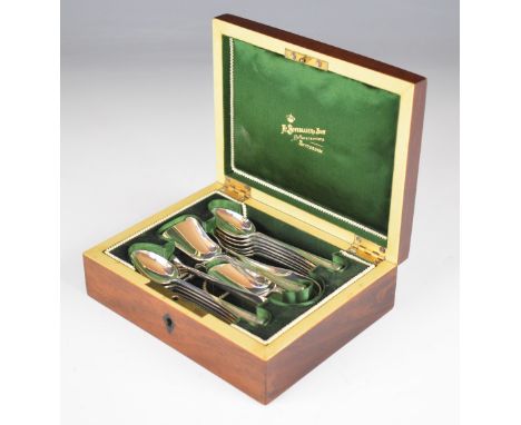 A Bonebakker &amp; Son Amsterdam cased set of Dutch silver cutlery comprising 12 teaspoons, sugar tongs, caddy spoon and scoo