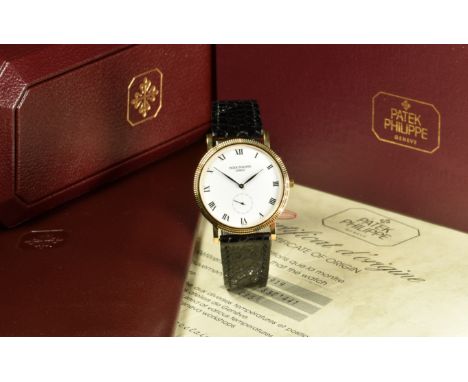 Patek Philippe gentleman's 18ct gold wristwatch ref. 3919 with subsidiary seconds dial, blued hands, black Roman numerals, wh