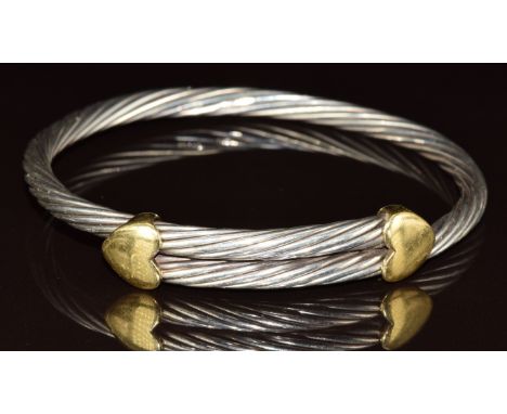 Tiffany &amp; Co rope twist silver bangle with two 18ct gold heart sliders, 36.2g, 5.8 x 6.2cm