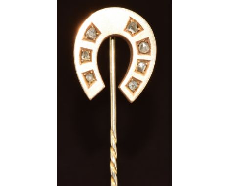 Victorian stick pin set in the form of a horseshoe set with seven rose cut diamonds, 5.2g