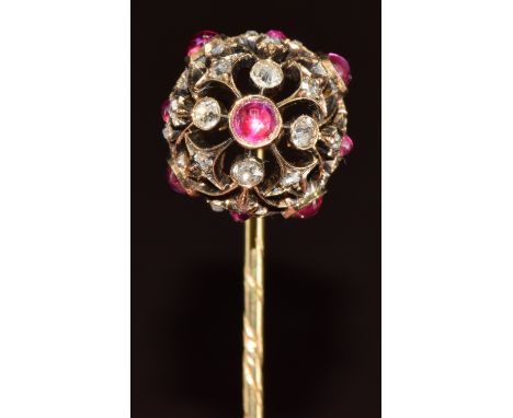 Victorian stick pin set with ruby cabochons and old and rose cut diamonds in a pierced sphere setting, 4g