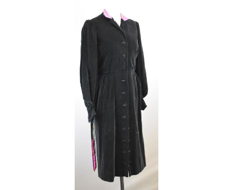 Herm&egrave;s ladies black velvet coat or coat dress, the collar and self tie belt lined with Herm&egrave;s patterned scarf s
