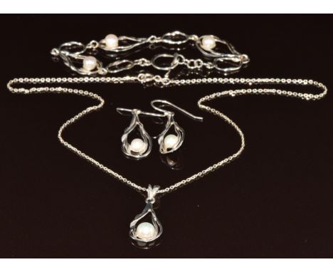 A suite of silver jewellery set with pearls comprising necklace, bracelet and earrings, 16.2g