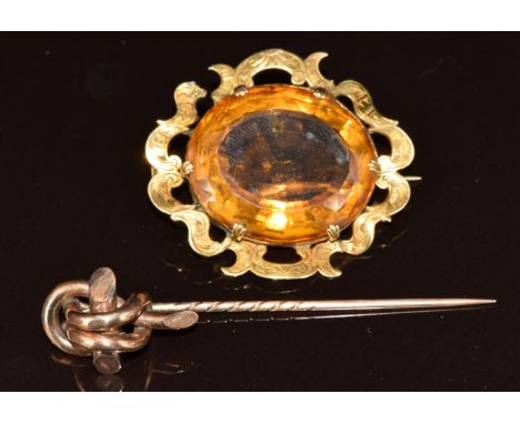 Victorian brooch set with a oval cut citrine (15.9g, 4 x 3.5cm) and a Victorian knot stick pin