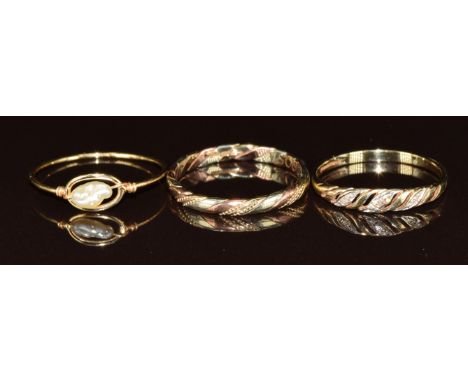 A 9ct gold ring set with diamonds, another 9ct gold ring (3g, sizes P &amp; Q) and an 18k gold ring set with a pearl (0.8g, s