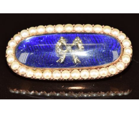 Victorian brooch set with blue guilloch&eacute; enamel, to the centre a bow set with diamonds and a border of split pearls, 7