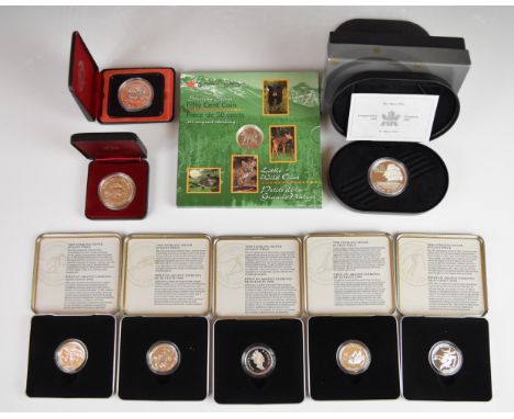 Ten Canadian silver coins comprising five sporting 1998 50 cent coins, 1996 Moose 50 cent coin, 1974 and 1977 $1 coins and a 