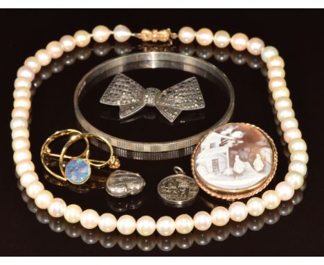 A single strand of cultured pearls with 9ct gold clasp, 9ct gold brooch set with a cameo depicting a village scene, silver ma