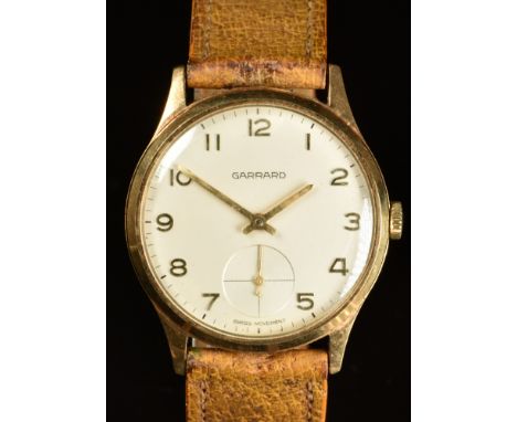 Garrard 9ct gold gentleman's wristwatch with subsidiary seconds dial, gold hands and Arabic numerals, silver dial and signed 