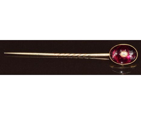 Victorian stick pin set with a foiled garnet and a further old cut diamond
