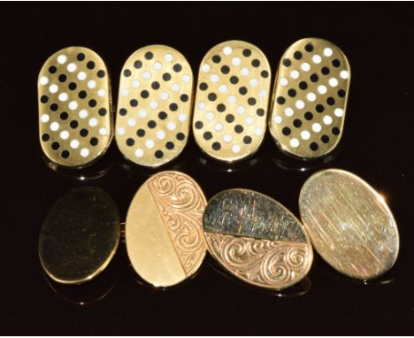 A pair of 9ct gold cufflinks with scrolling decoration (5.4g) and a pair of silver gilt cufflinks with enamel decoration&nbsp