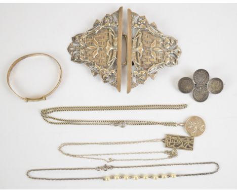 A collection of silver jewellery including chain, coin brooch, bangle, pendant and Art Nouveau belt buckle, 103g