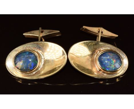 A pair of 9ct gold cufflinks set with opal doublets, 16g