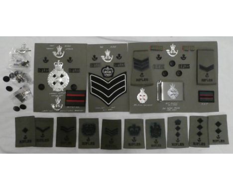 A collection of the Rifles badges and insignia including Warrant Officer's shoulder belt plate, sash badge, cap badges, title