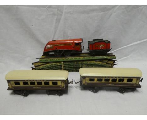 A Chad Valley tinplate National Express O gauge engine, tender, two double-bogie Pullman coaches and a selection of track