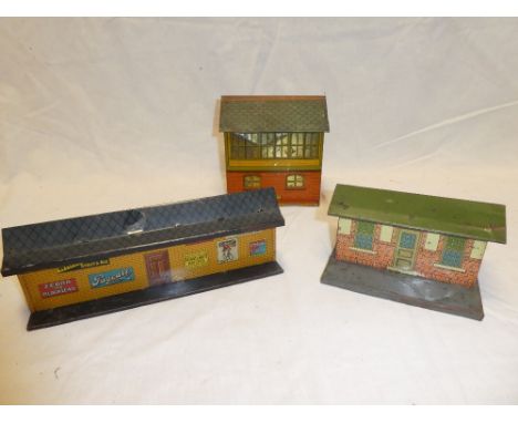 Two pre-War tinplate station buildings and a Hornby O gauge signal box