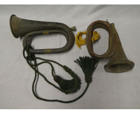 An old brass mounted copper military bugle by J R Lafleur &amp; Son London with cord tassles and one other brass mounted copp