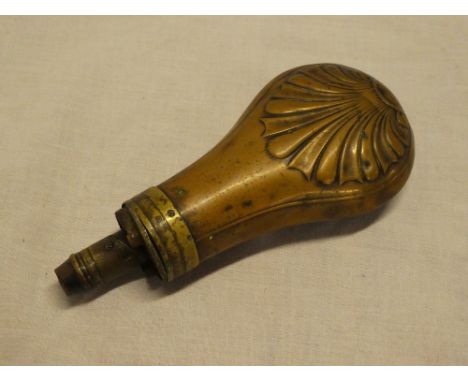 A 19th Century copper mounted powder flask with acanthus decoration (af)