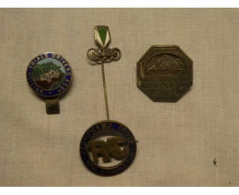 An enamelled DKW Auto Union stick pin, RAC Certificated Drivers lapel badge, Engelberger Bobsleigh-Club 1912-13 badge and one