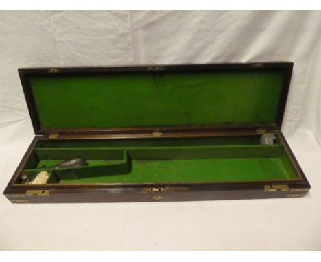 A 19th Century brass mounted mahogany gun case with inset lift-out handle, baize lined interior to fit 31" barrels together w