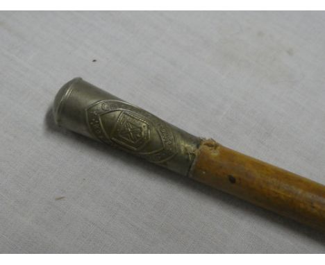 A Cadet's swagger stick with nickel plated top bearing the badge for the Truro Cathedral School Cadets