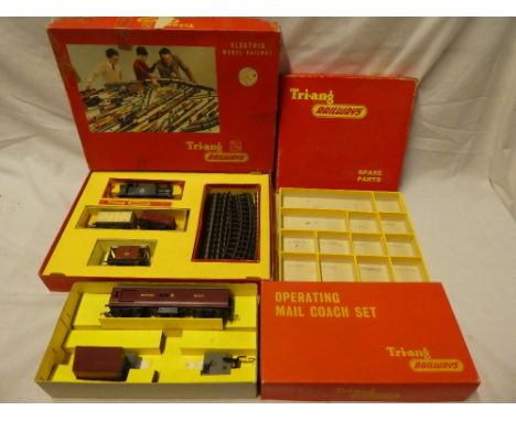 Tri-ang OO gauge - RS4 goods train set with tank engine in original box; operating mail coach set, boxed and a Tri-ang spare 