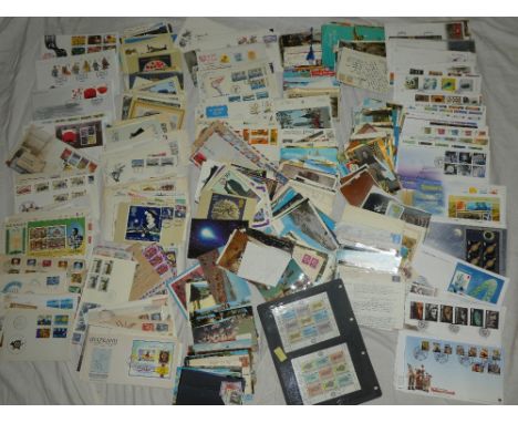 A large selection of various GB first day covers together with modern postcards, World covers, etc