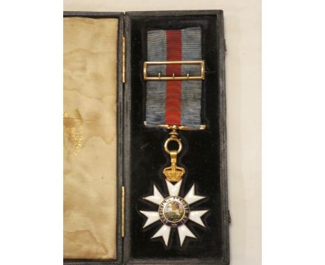 A rare pre 1887 18ct gold and enamel Order of St Michael and St George with original ribbon and suspension in fitted Garrard'