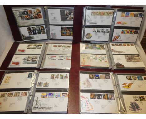 Six albums containing a collection of GB first day covers 1980 - 2014