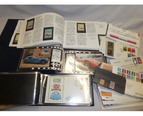 Two albums of Auto 100 car related first day covers and postal covers, an album of Auto 100 mint car related stamps and a sel