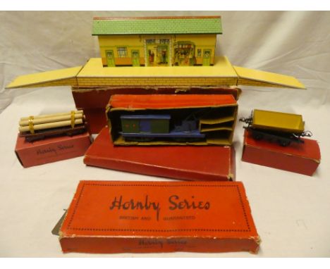 Hornby O gauge - boxed tinplate station, double-bogie crane wagon in part box, two boxed wagons and two boxed sets of points