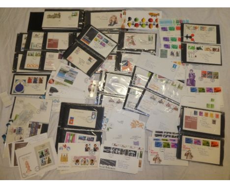 A box containing a large selection of GB first day covers 1960s-2000s