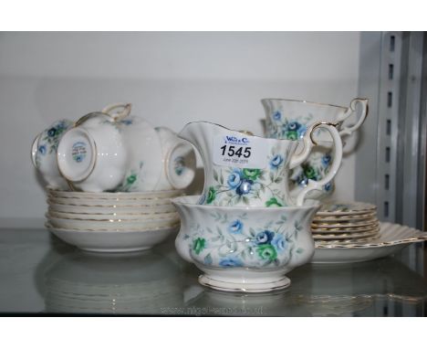 A Royal Albert 'Inspirations' bone china vintage part Teaset comprising six cups, saucers, and tea plates, plus milk jug, sug