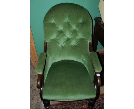 A good 19th c. Mahogany show frame Armchair in green button back draylon upholstery, scroll end arms, standing on turned tape