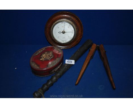 A rubber Truncheon, a wooden handled nut cracker, lacquered trinket box and small Oak framed barometer