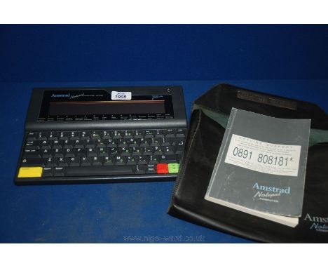 A cased Amstrad Notepad NC 100 Computer with manual