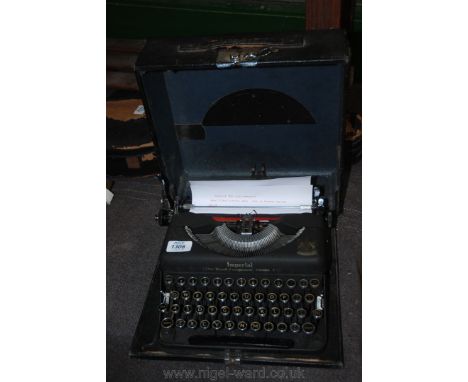 An Imperial model T vintage typewriter (fully working) with case