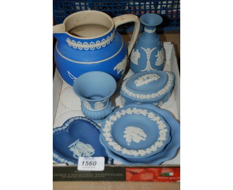 A quantity of Wedgwood blue Jasperware including Pin Dishes, Trinket Pot, bud Vase etc. and a Jasperware style Jug.